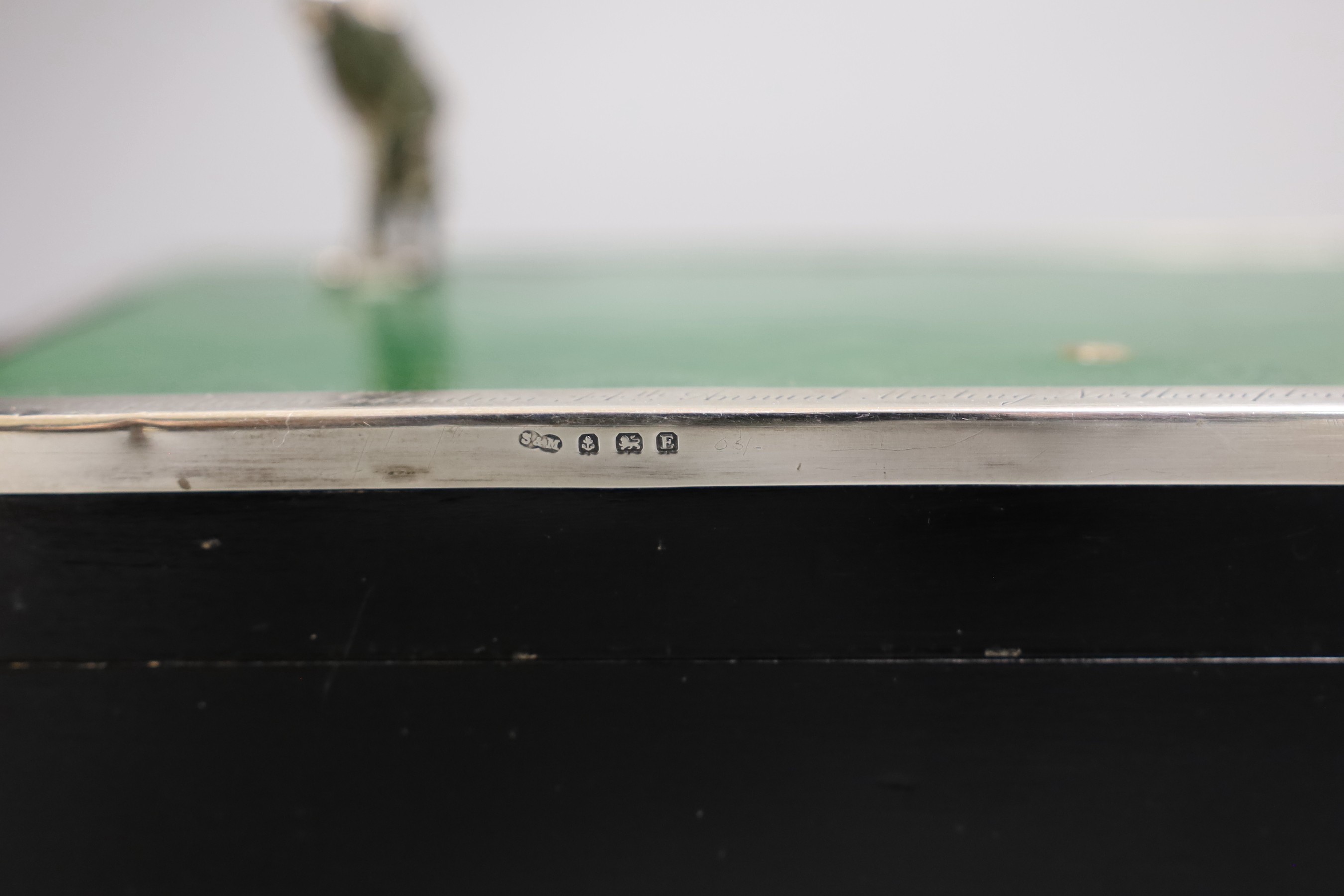 A George V silver and leather mounted golf related card box, with engraved inscription dated 1934, Sanders & MacKenzie, Birmingham, 1930, 17.2cm.
